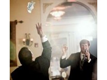 Rob directing John during the garter toss